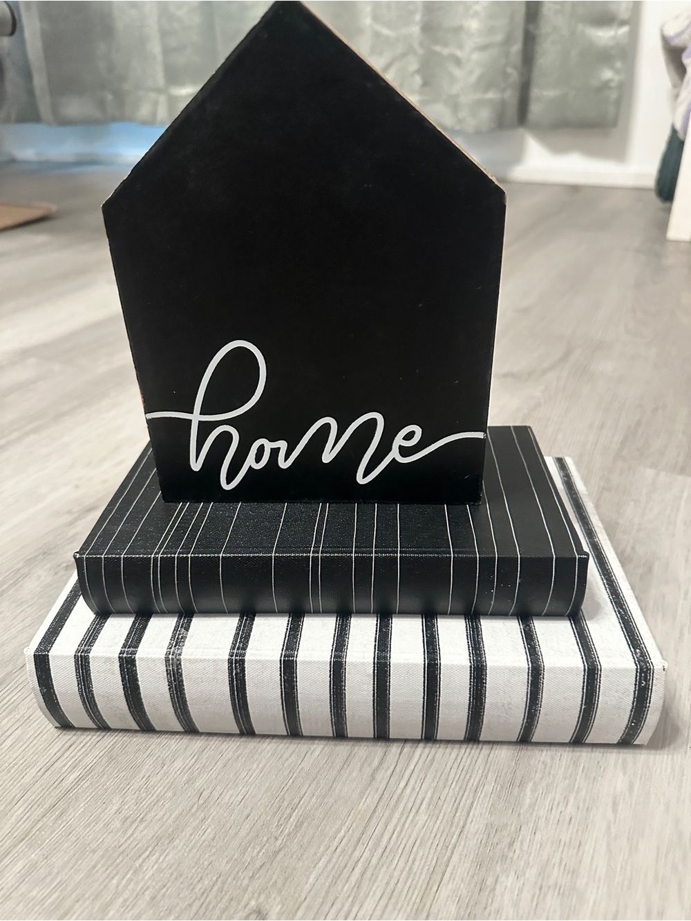 Black 'Home' Decorative Wooden House with Striped Book Stack